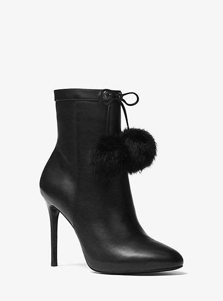 michael kors black pom pom boots|Michael Kors designer boots.